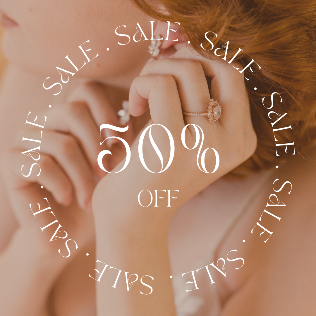 Close-up of a woman’s hands wearing gold rings, with overlay text reading “50% OFF” and “SALE” in a circular layout.