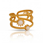 Adjustable gold sun and moon pearl ring on white background, stainless steel waterproof celestial open ring
