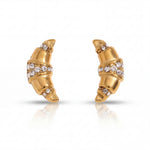 Gold earrings with diamond accents on a white background