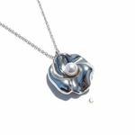 Silver Bloom – Sculpted Flower Necklace with Luminous Pearl