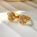 Gold Moonlight ring with celestial motifs including crescent moon, evil eye, and colorful zirconia. Symbolic jewelry in warm sunlight, perfect for gifting. Waterproof, gold-plated stainless steel.