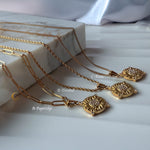 Comparison of all three Soleia chains — paperclip, twisted and basic — on marble for easy styling choice