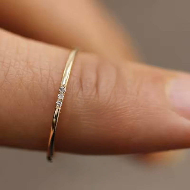 Minimalist Waterproof Ring – Delicate Gold Band with Tiny Zircon Stones.