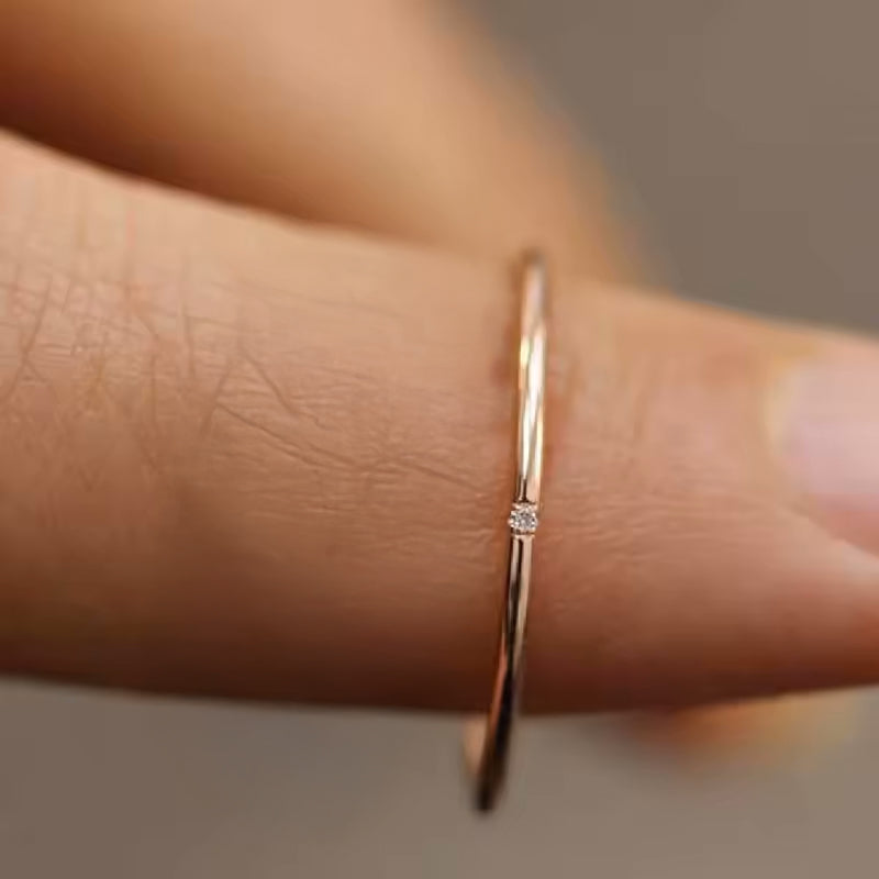 Minimalist Waterproof Ring – Delicate Gold Band with Tiny Zircon Stones.