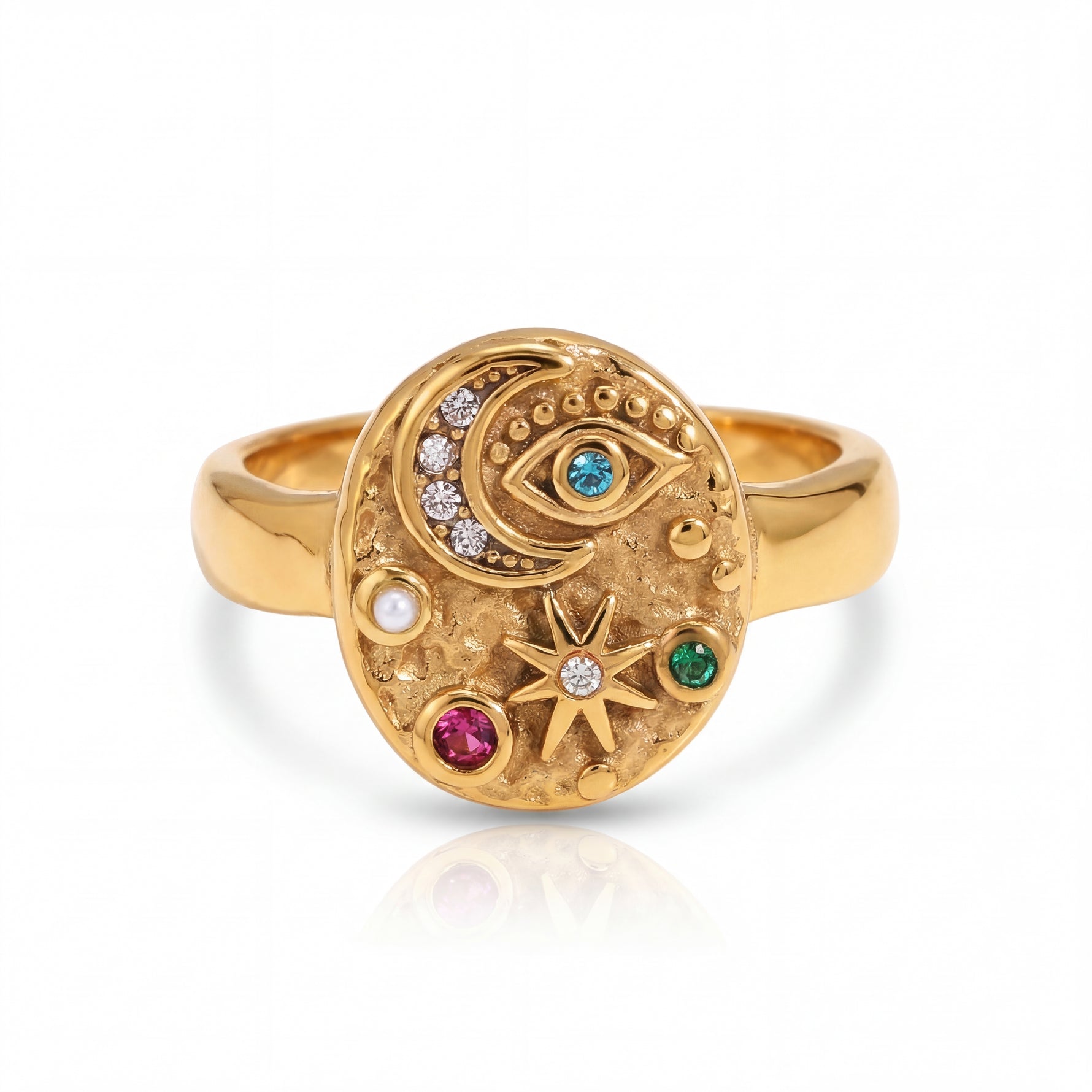 Gold ring with celestial design and colorful gemstones on a white background
