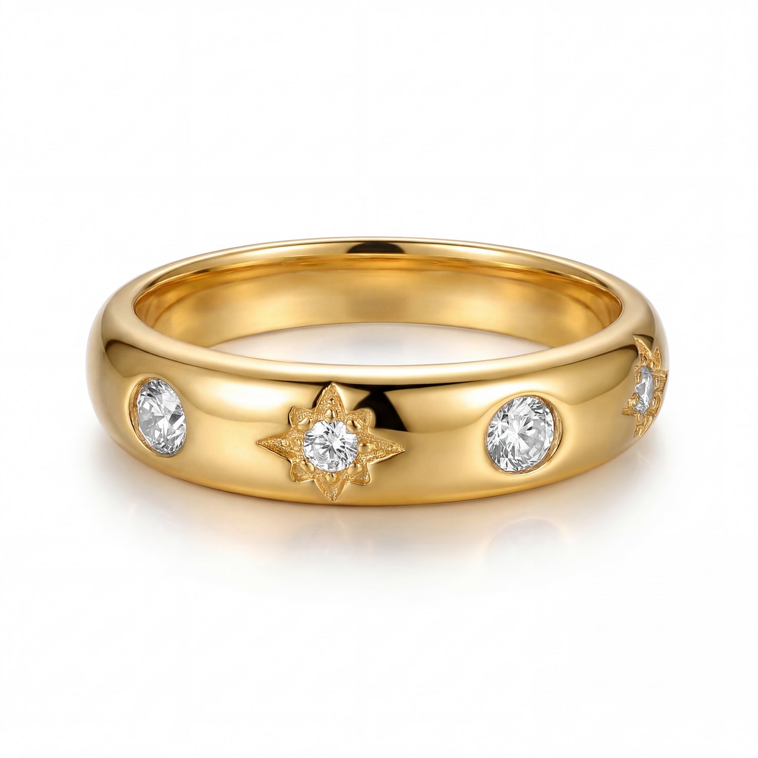 Gold ring with diamond accents on a white background