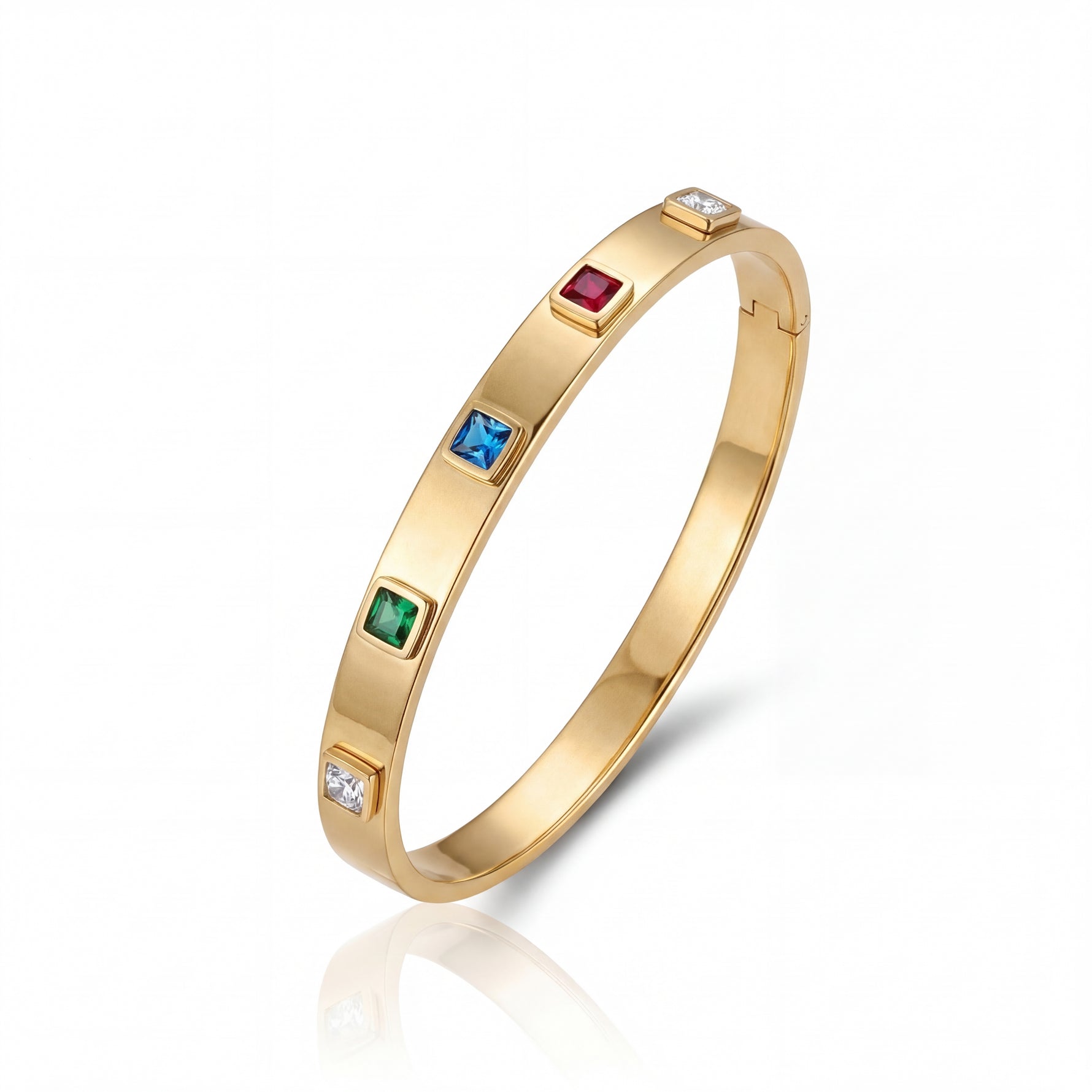 Gold bracelet with colorful gemstones on a white background