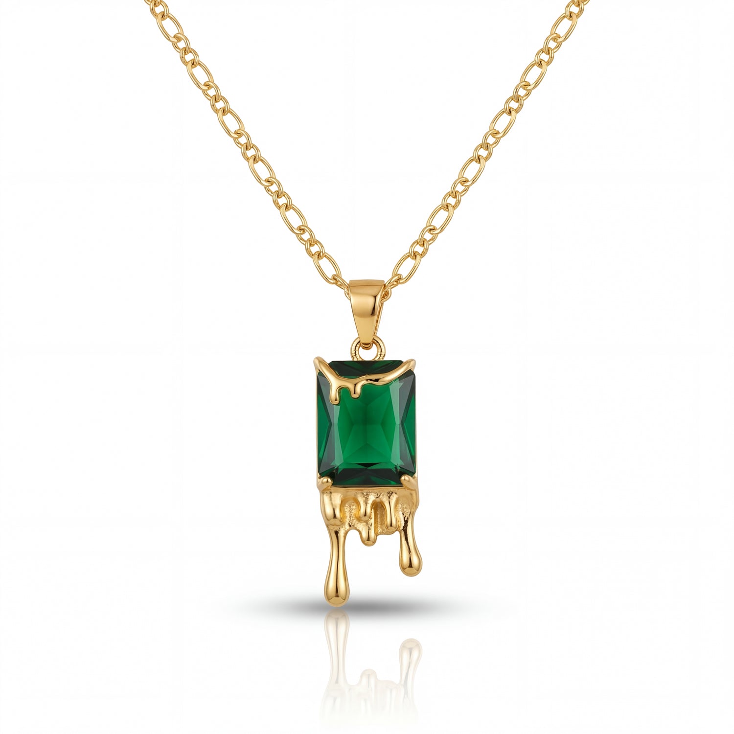 Gold necklace with a green gemstone pendant on a white background