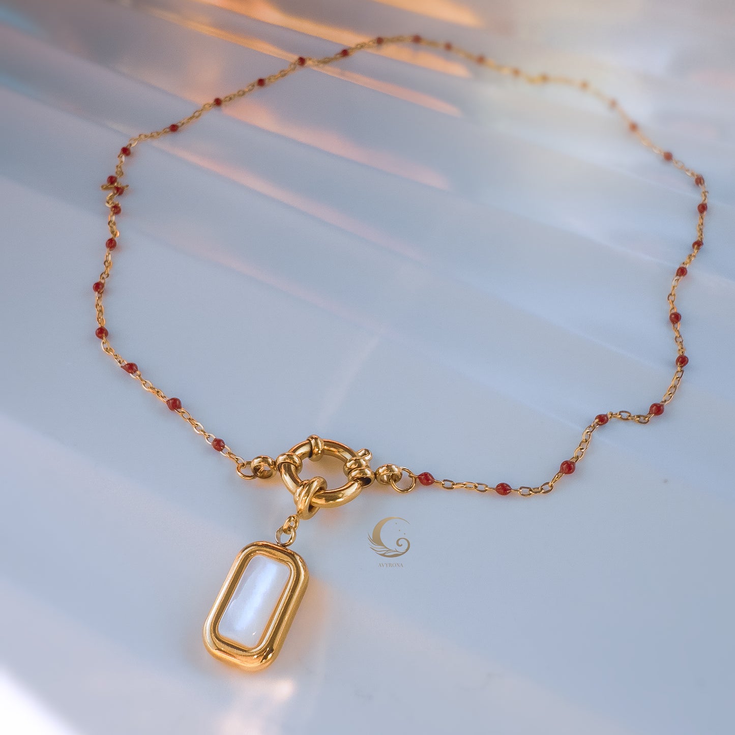 Maris – Red Beaded Necklace with Mother of Pearl Pendant.