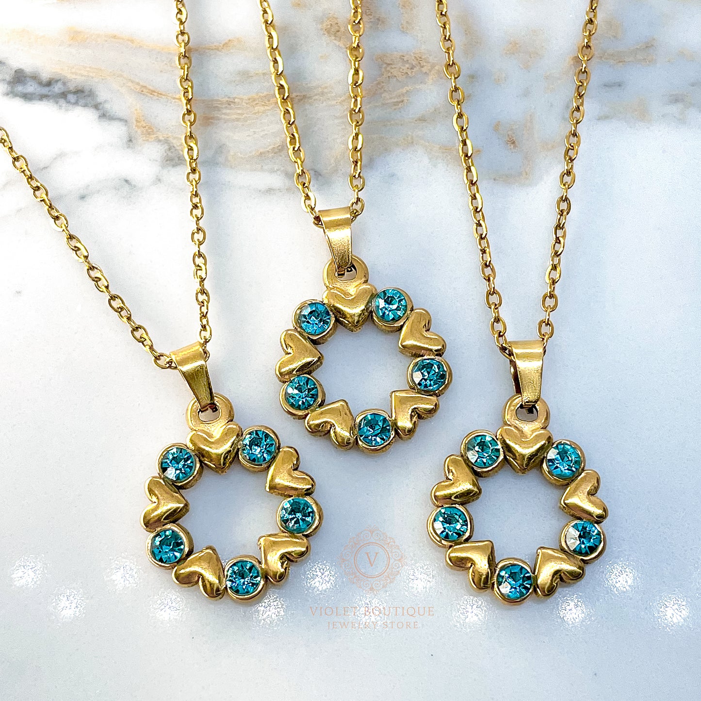 VB Elsa , 18K Gold Plated Aquamarine Hearts Circle Necklace.