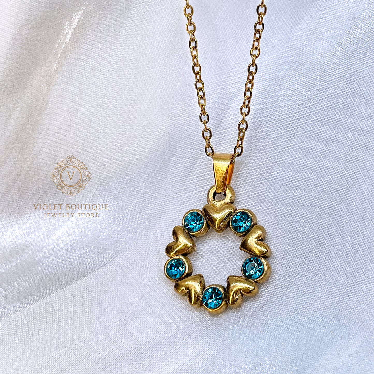 VB Elsa , 18K Gold Plated Aquamarine Hearts Circle Necklace.