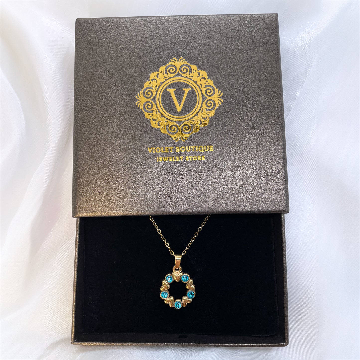 VB Elsa , 18K Gold Plated Aquamarine Hearts Circle Necklace.