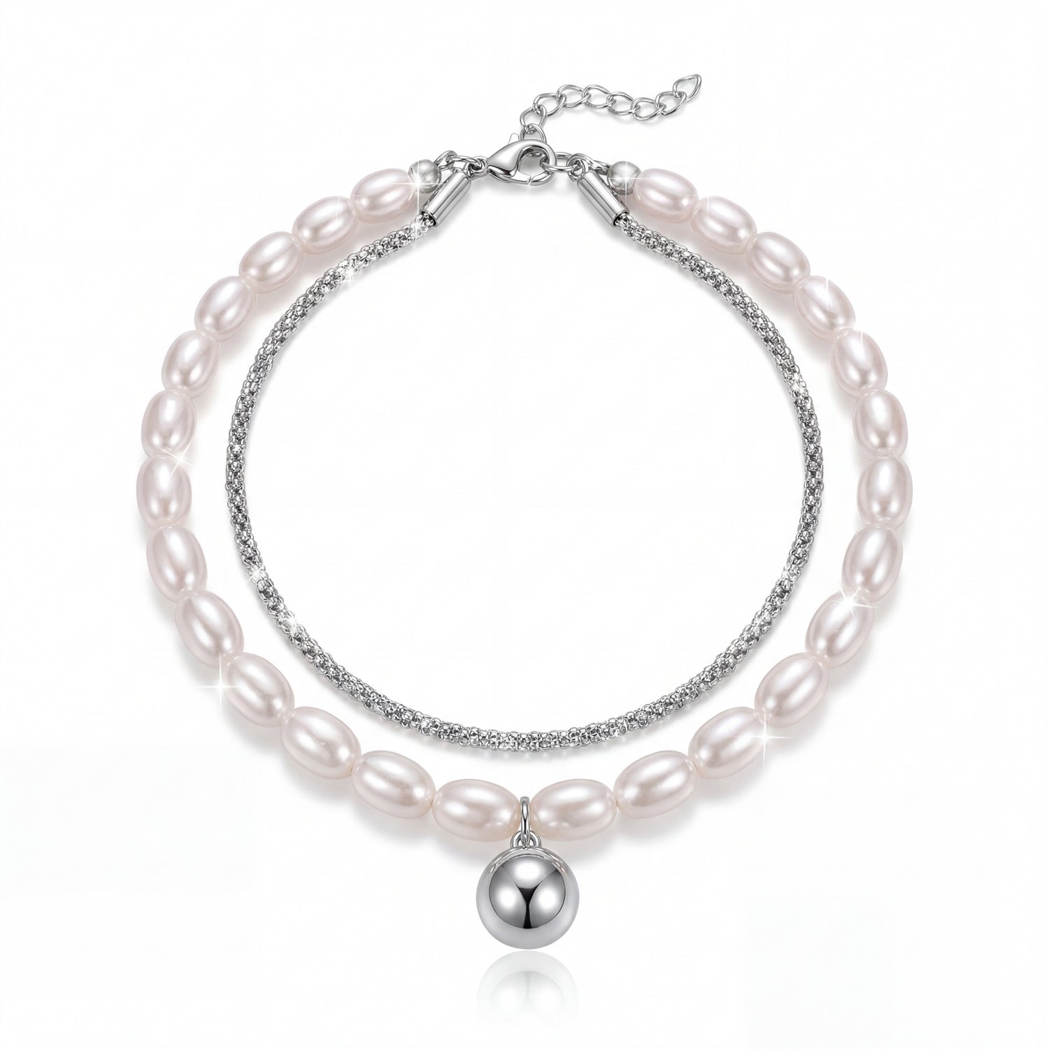 Pearl bracelet with silver accents on a white background