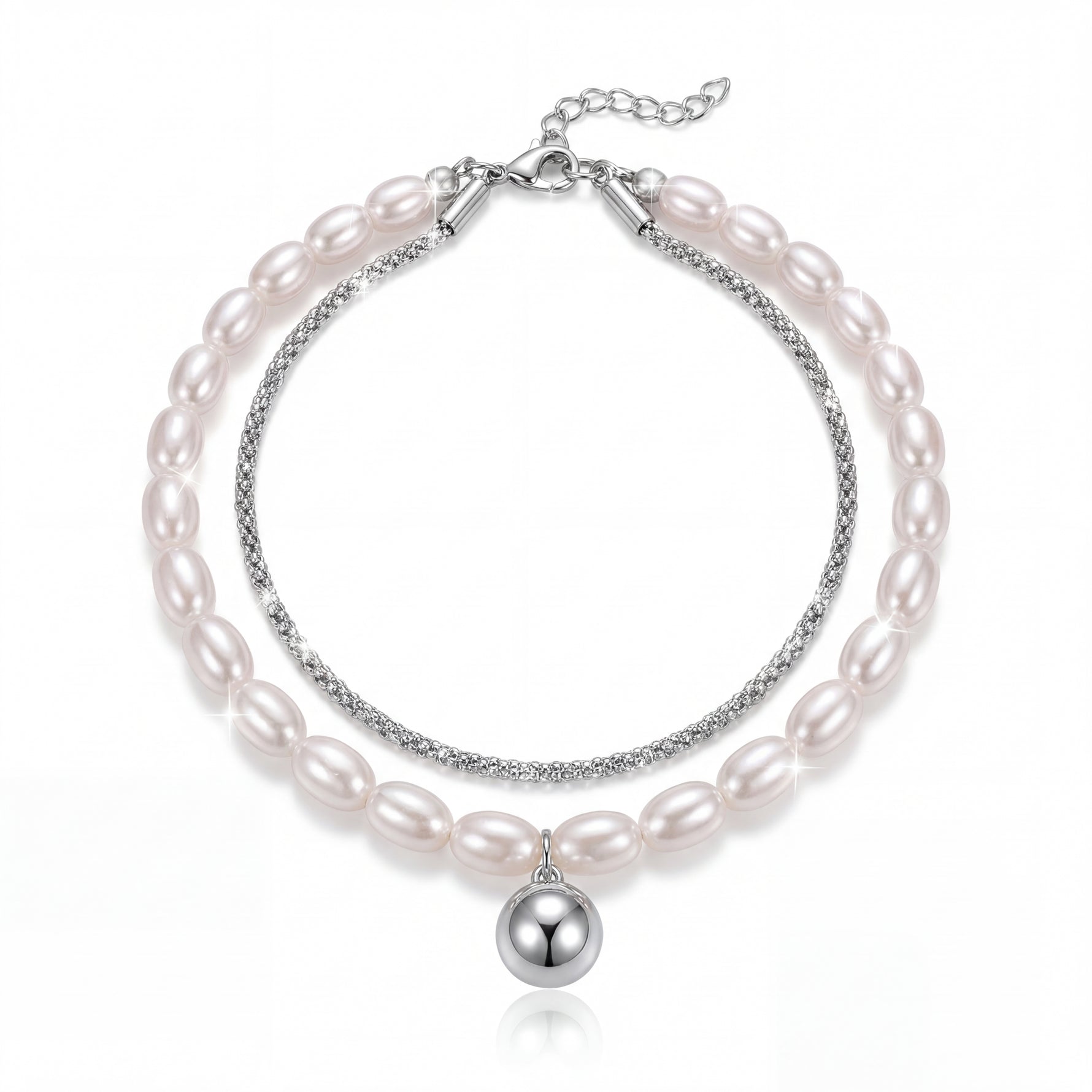 Pearl bracelet with silver accents on a white background