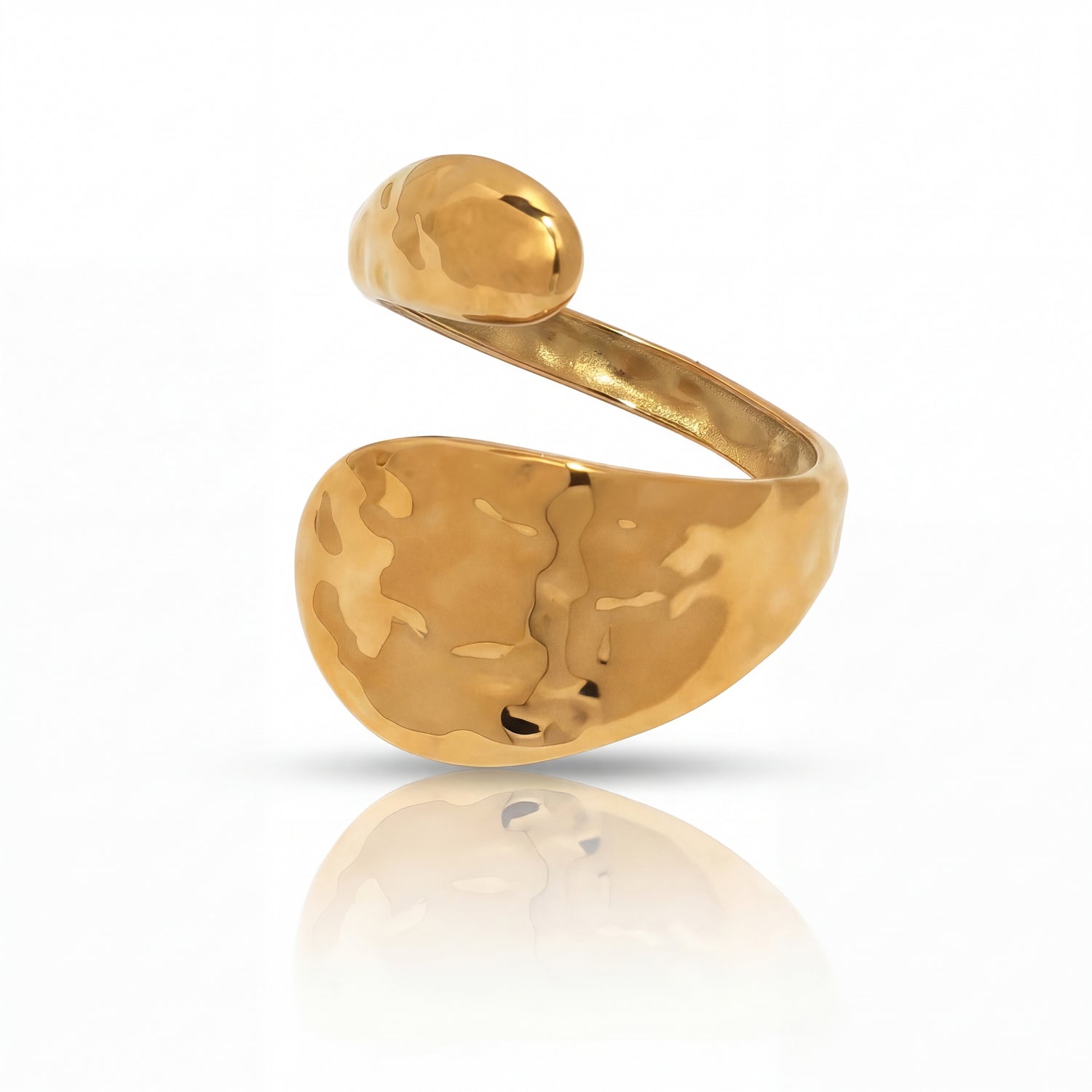 Gold ring with a textured design on a white background
