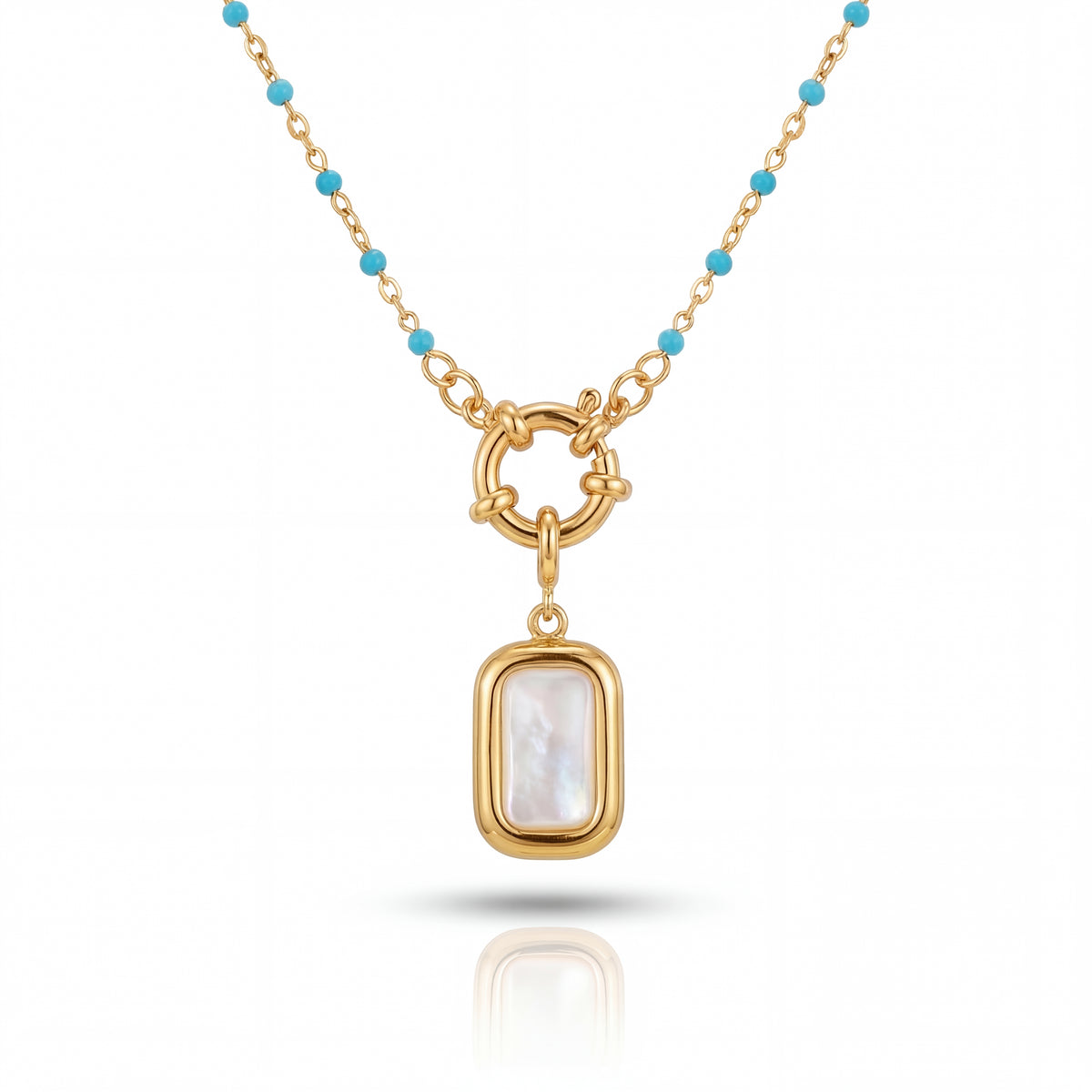 Gold necklace with a pendant on a white background