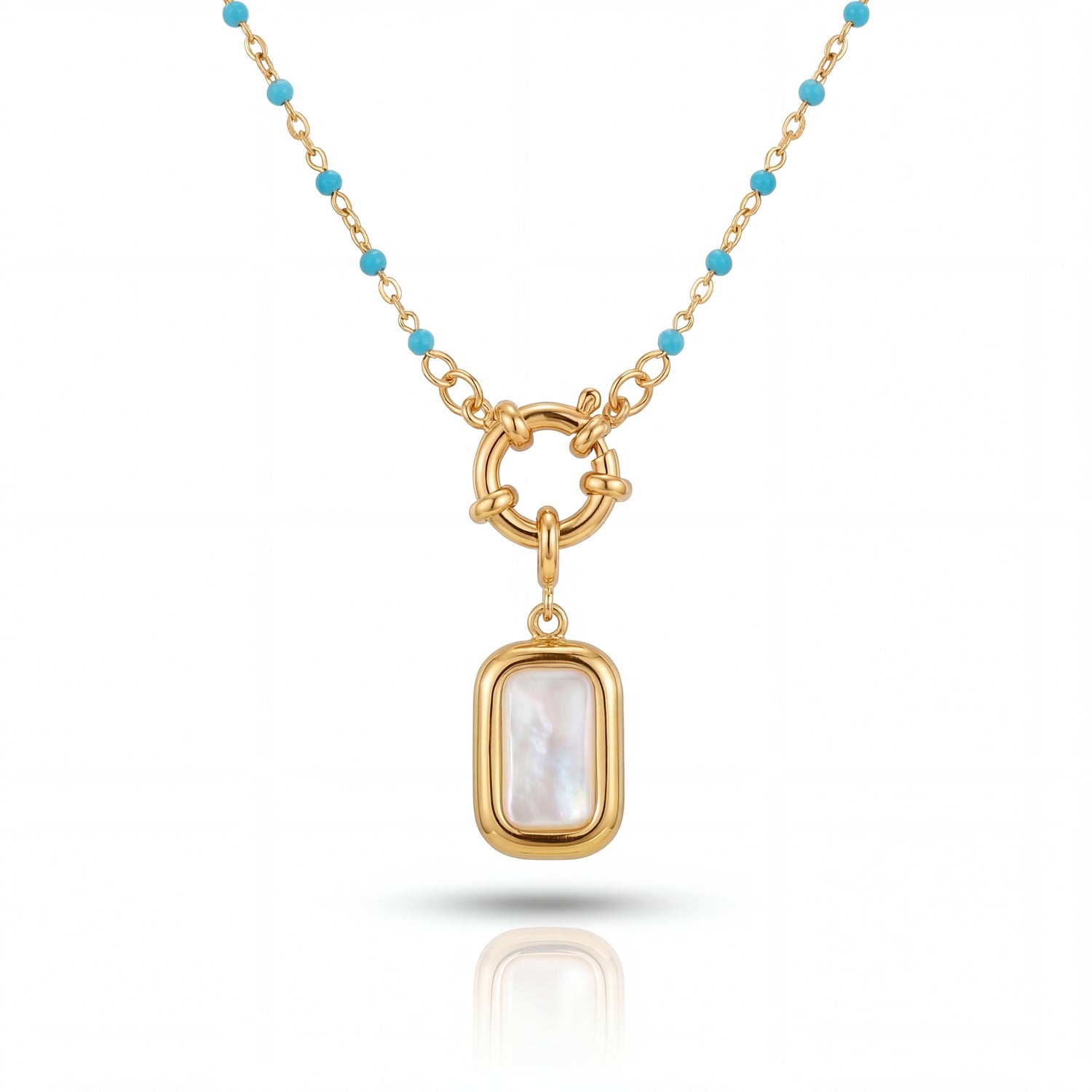 Gold necklace with a pendant on a white background