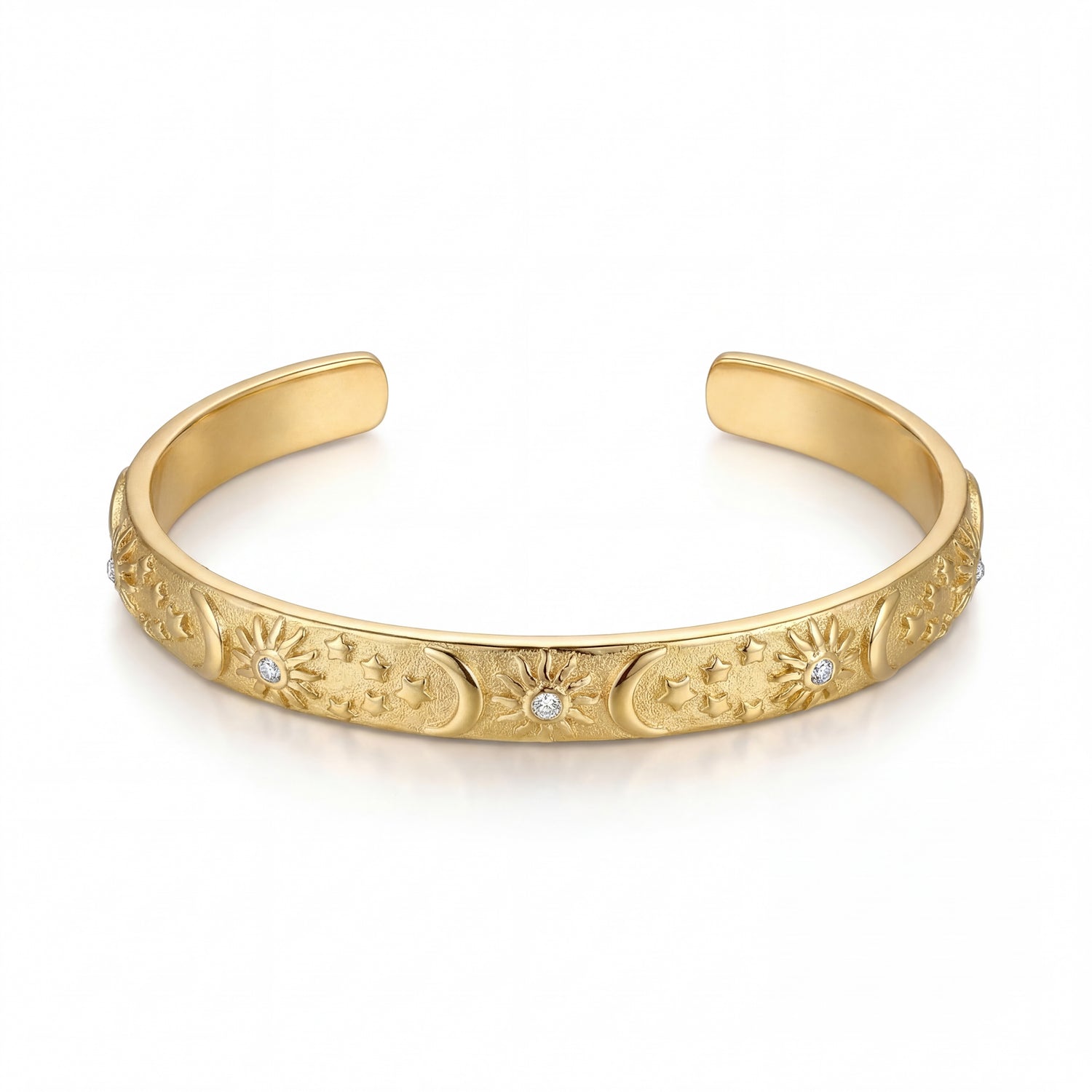 Gold bracelet with intricate designs and small diamonds on a white background