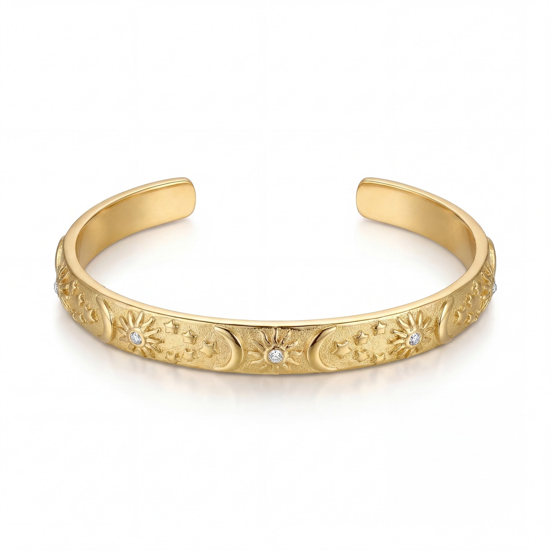 Gold bracelet with intricate designs and small diamonds on a white background