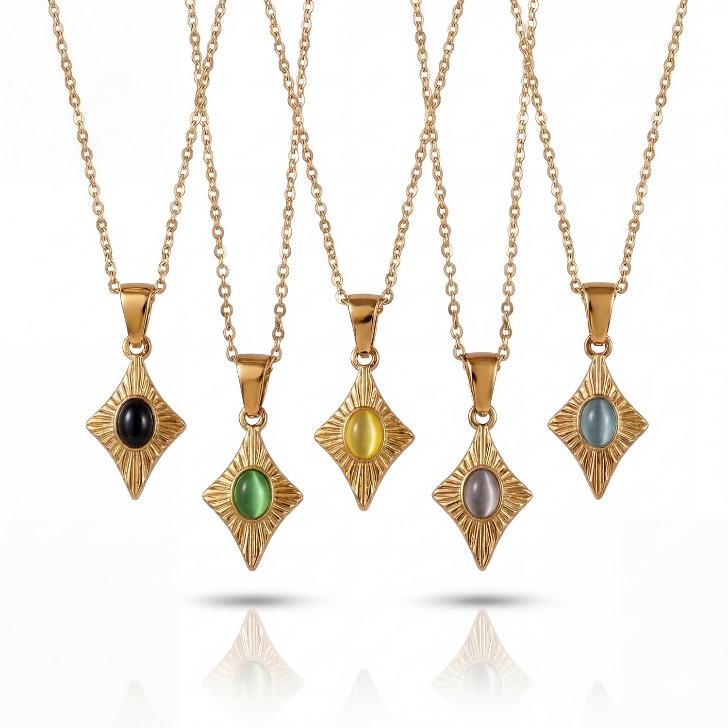 Set of gold necklaces with various gemstone pendants on a white background