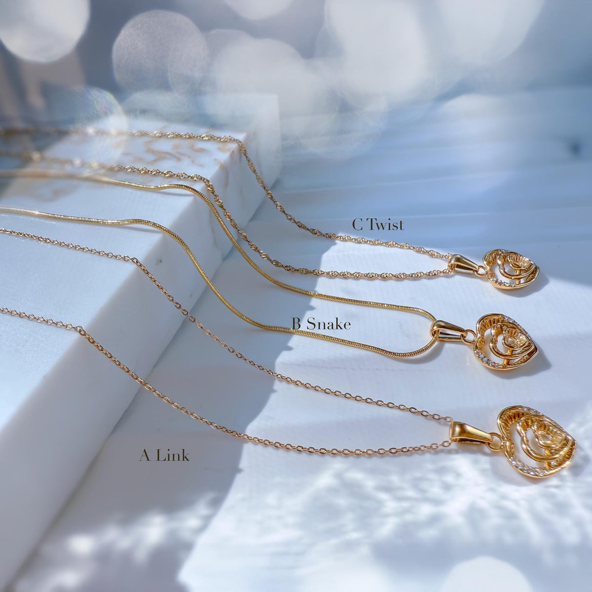 Triple Heart Layered Necklace with Cubic Zirconia