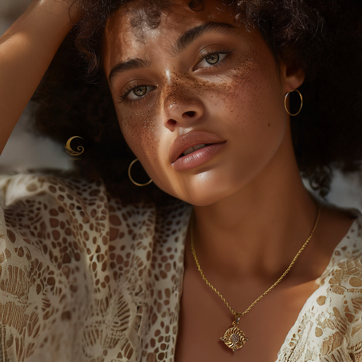 Model wearing Soleia sun necklace — glowing skin, natural curls, and radiant feminine energy